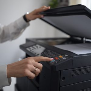 woman work office using printer
